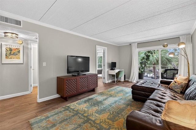 3325 Bayshore Blvd Unit A31, Tampa, FL 33629 - living area with a textured ceiling, wood finished floors, and ornamental molding