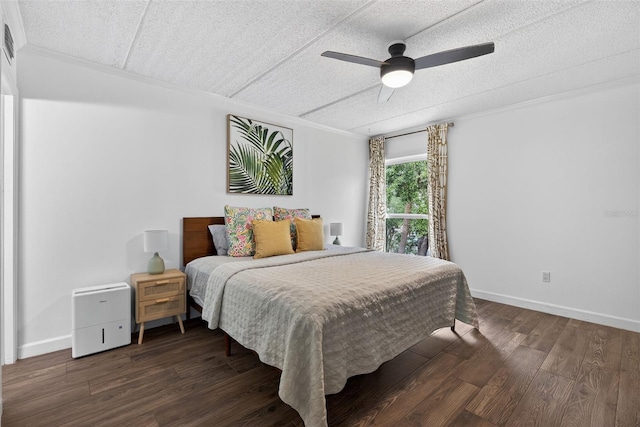 3325 Bayshore Blvd Unit A31, Tampa, FL 33629 - bedroom featuring crown molding, a textured ceiling, wood finished floors, and a ceiling fan