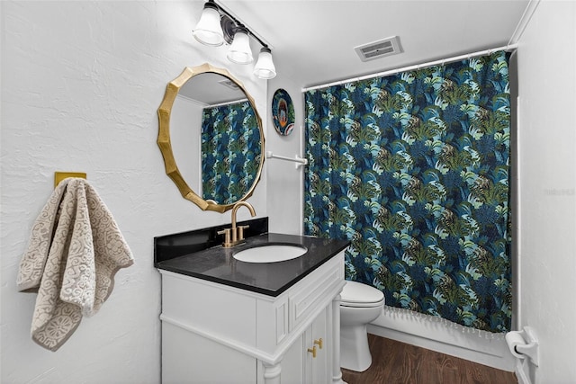 3325 Bayshore Blvd Unit A31, Tampa, FL 33629 - full bathroom featuring vanity and wood finished floors