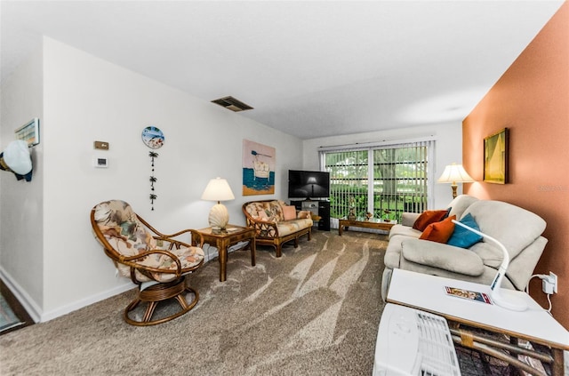 2700 Bayshore Blvd Unit 4106, Dunedin, FL 34698 - carpeted living room with baseboards