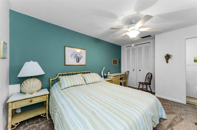 2700 Bayshore Blvd Unit 4106, Dunedin, FL 34698 - carpeted bedroom featuring a closet and a ceiling fan