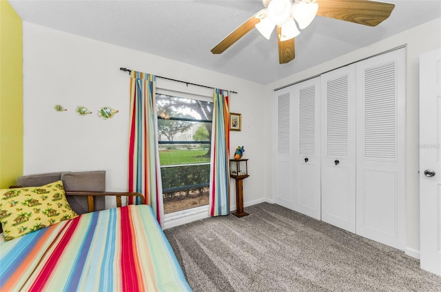 2700 Bayshore Blvd Unit 4106, Dunedin, FL 34698 - carpeted bedroom with a closet and a ceiling fan