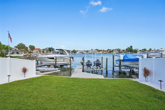 311 22nd St, Belleair Beach, FL 33786 - dock area featuring boat lift and a water view