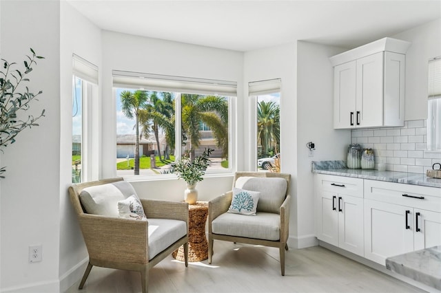 311 22nd St, Belleair Beach, FL 33786 - living area with baseboards