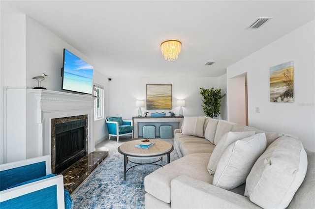 311 22nd St, Belleair Beach, FL 33786 - living room featuring a high end fireplace