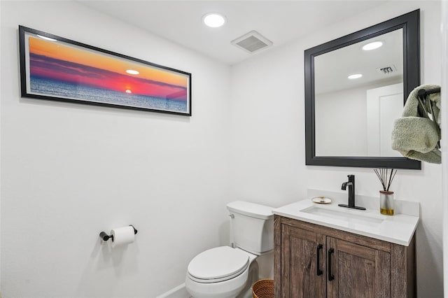 311 22nd St, Belleair Beach, FL 33786 - half bathroom featuring vanity and recessed lighting