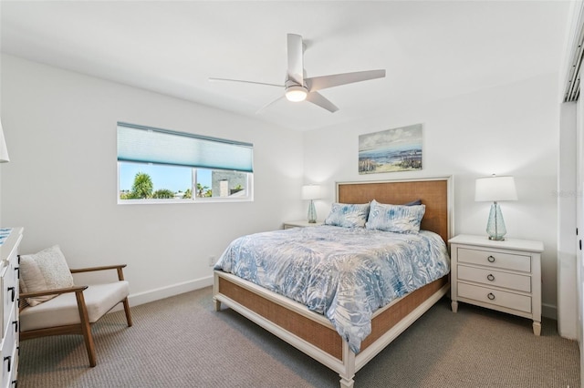 311 22nd St, Belleair Beach, FL 33786 - carpeted bedroom featuring ceiling fan and baseboards