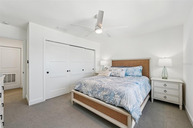 311 22nd St, Belleair Beach, FL 33786 - carpeted bedroom featuring a closet and a ceiling fan