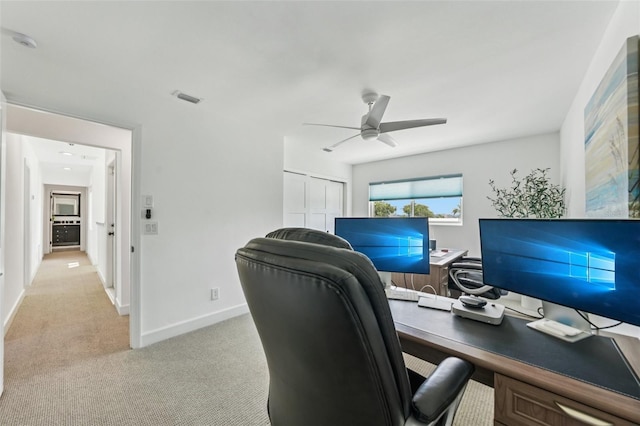 311 22nd St, Belleair Beach, FL 33786 - office with ceiling fan and light colored carpet