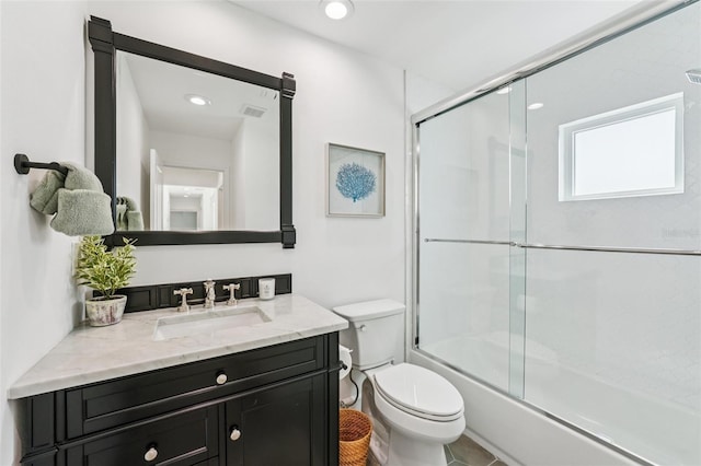 311 22nd St, Belleair Beach, FL 33786 - full bathroom with vanity and enclosed tub / shower combo