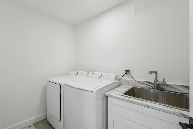 311 22nd St, Belleair Beach, FL 33786 - washroom with washing machine and dryer and a sink