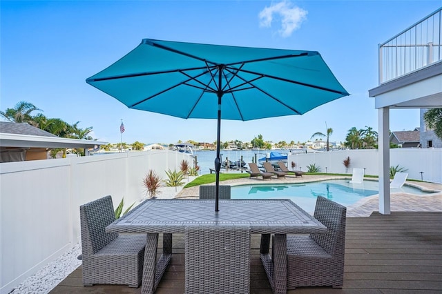 311 22nd St, Belleair Beach, FL 33786 - view of swimming pool featuring a fenced backyard, outdoor dining area, and a patio