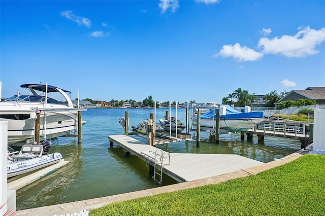 311 22nd St, Belleair Beach, FL 33786 - dock featuring boat lift and a water view