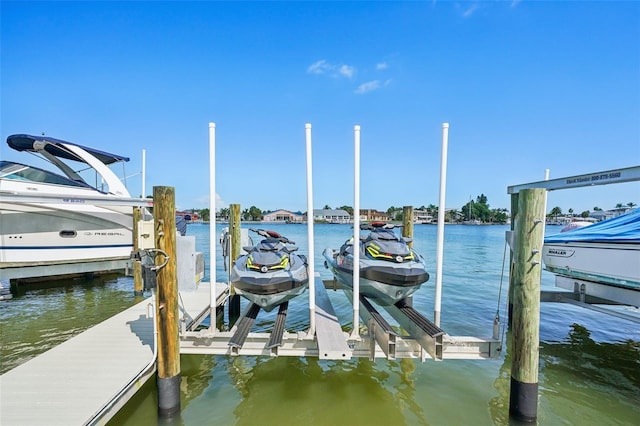 311 22nd St, Belleair Beach, FL 33786 - dock area with boat lift and a water view