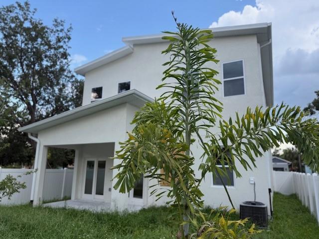 2404 Cassell St, Tampa, FL 33605 - back of property featuring stucco siding