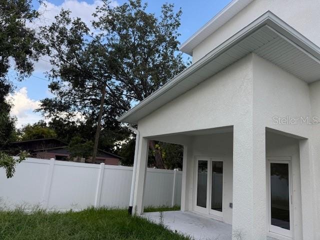 2404 Cassell St, Tampa, FL 33605 - view of property exterior with stucco siding