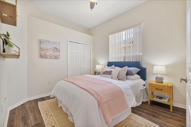 2537 Stanhope Dr, New Port Richey, FL 34655 - bedroom with wood finished floors, a closet, and a ceiling fan