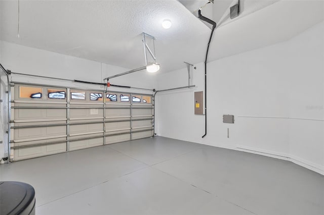 2537 Stanhope Dr, New Port Richey, FL 34655 - garage with electric panel and a garage door opener