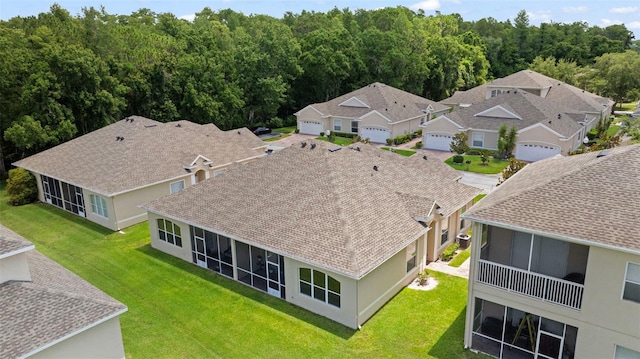 2537 Stanhope Dr, New Port Richey, FL 34655 - aerial perspective of suburban area featuring a forest