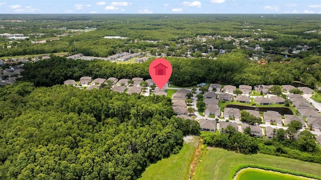 2537 Stanhope Dr, New Port Richey, FL 34655 - aerial perspective of suburban area featuring a heavily wooded area