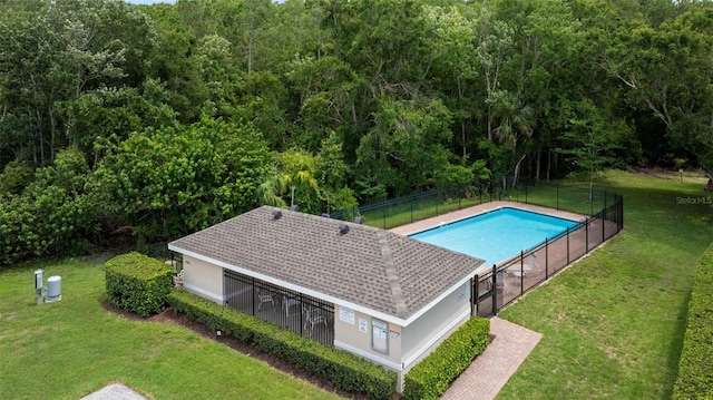 2537 Stanhope Dr, New Port Richey, FL 34655 - view of swimming pool with a view of trees