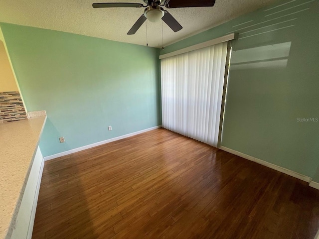 2625 State Road 590 Unit 2514, Clearwater, FL 33759 - unfurnished room with ceiling fan, wood finished floors, and a textured ceiling