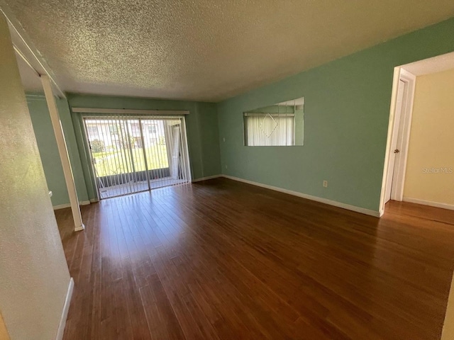 2625 State Road 590 Unit 2514, Clearwater, FL 33759 - unfurnished room with a textured ceiling and wood finished floors