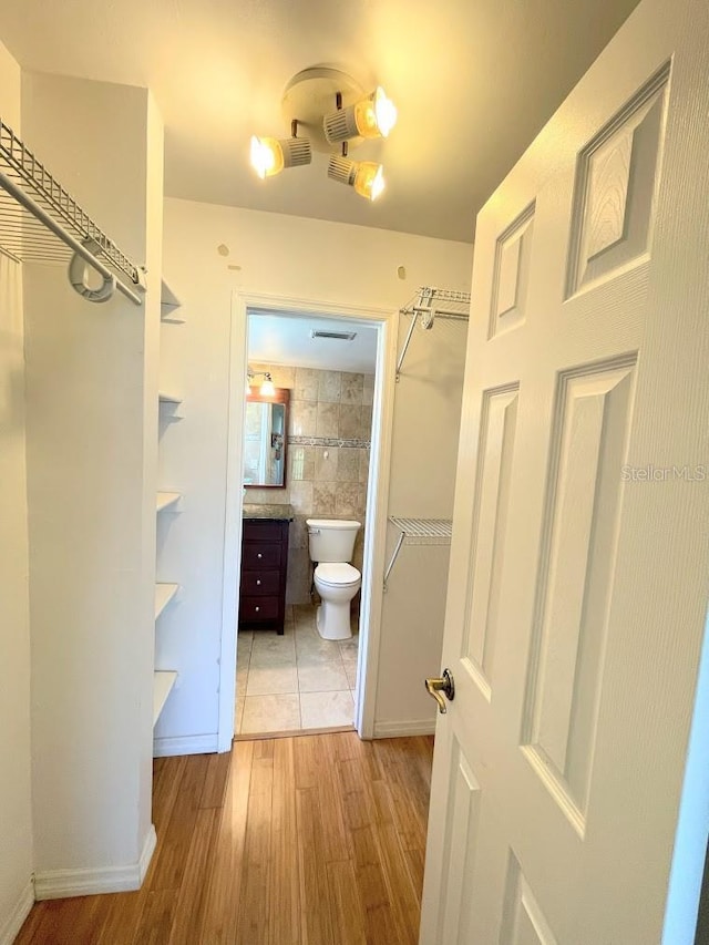 2625 State Road 590 Unit 2514, Clearwater, FL 33759 - full bath with vanity and wood finished floors