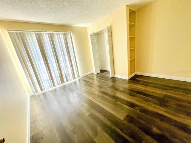 2625 State Road 590 Unit 2514, Clearwater, FL 33759 - unfurnished room featuring wood finished floors and a textured ceiling
