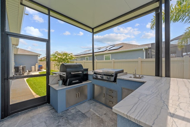 11714 Tetrafin Dr, Riverview, FL 33579 - view of patio with exterior kitchen and a sink