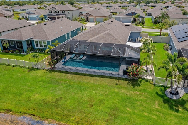 11714 Tetrafin Dr, Riverview, FL 33579 - view of swimming pool featuring a fenced backyard, a residential view, glass enclosure, and a patio area