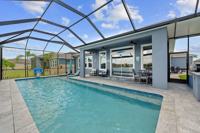 11714 Tetrafin Dr, Riverview, FL 33579 - outdoor pool featuring a patio, ceiling fan, glass enclosure, and outdoor dining space
