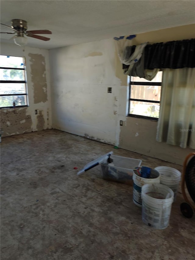 13710 Frances Ave, Hudson, FL 34667 - unfurnished room with a ceiling fan and a textured ceiling