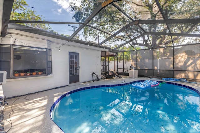 489 W Davis Blvd, Tampa, FL 33606 - view of swimming pool with glass enclosure and a patio