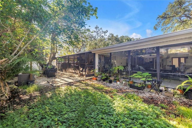 489 W Davis Blvd, Tampa, FL 33606 - view of yard with a sunroom