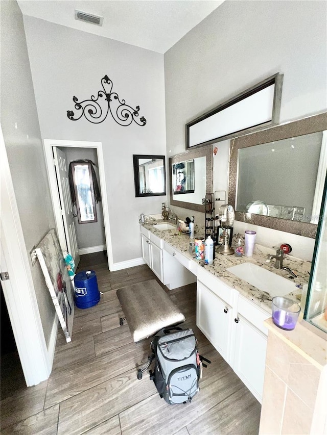 12603 Midpointe, Riverview, FL 33578 - bathroom with double vanity and wood finished floors