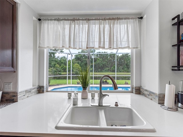 12439 Bristol Commons Cir, Tampa, FL 33626 - kitchen view of a sink and light countertops