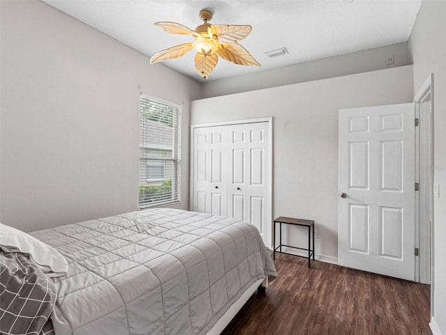 12439 Bristol Commons Cir, Tampa, FL 33626 - bedroom featuring a closet, wood finished floors, and a ceiling fan