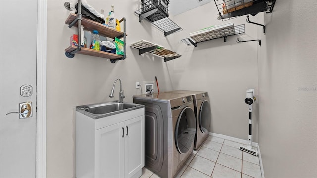 12439 Bristol Commons Cir, Tampa, FL 33626 - laundry room with separate washer and dryer and light tile patterned flooring