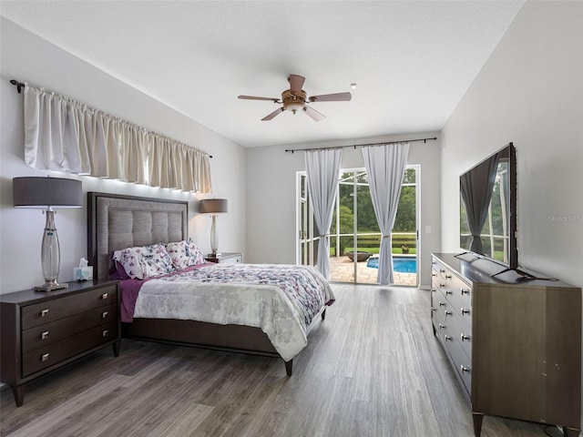 12439 Bristol Commons Cir, Tampa, FL 33626 - bedroom with access to outside, wood finished floors, and a ceiling fan