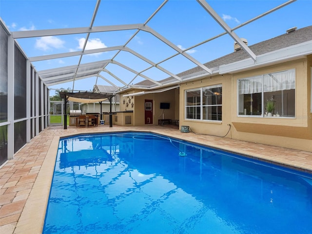 12439 Bristol Commons Cir, Tampa, FL 33626 - outdoor pool featuring a patio area and a lanai