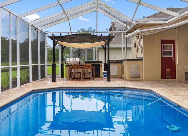 12439 Bristol Commons Cir, Tampa, FL 33626 - outdoor pool with area for grilling, a lanai, and a patio area