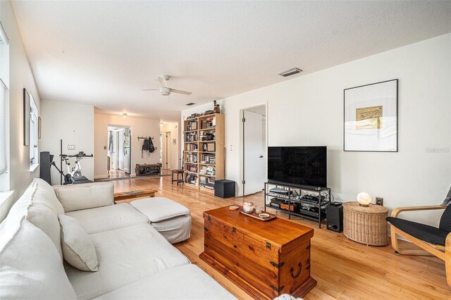 2368 Flanders Way Unit D, Safety Harbor, FL 34695 - living area featuring light wood-style floors and ceiling fan