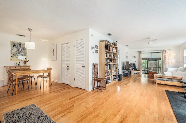 2368 Flanders Way Unit D, Safety Harbor, FL 34695 - living area with light wood-type flooring and a ceiling fan