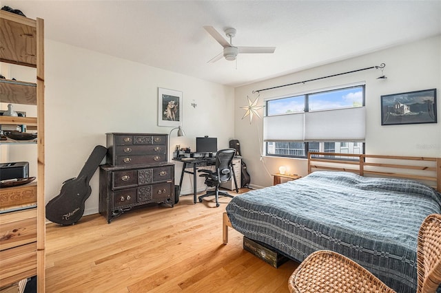 2368 Flanders Way Unit D, Safety Harbor, FL 34695 - bedroom featuring wood finished floors, a desk, and ceiling fan