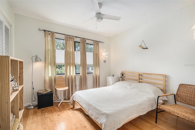 2368 Flanders Way Unit D, Safety Harbor, FL 34695 - bedroom with light wood-type flooring, ceiling fan, and a closet
