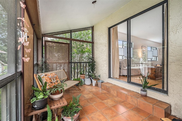 2368 Flanders Way Unit D, Safety Harbor, FL 34695 - sunroom / solarium featuring plenty of natural light and vaulted ceiling