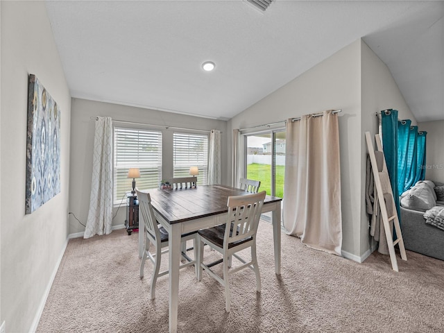 13105 Fruitville Way, Riverview, FL 33579 - dining area featuring light carpet and lofted ceiling