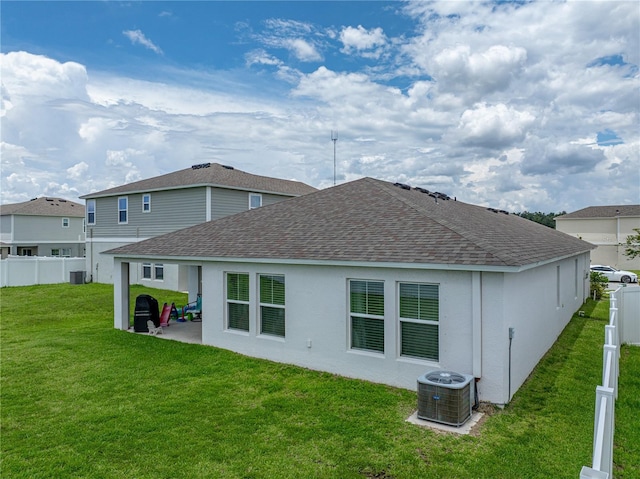 13105 Fruitville Way, Riverview, FL 33579 - rear view of property featuring a shingled roof, stucco siding, and a patio area