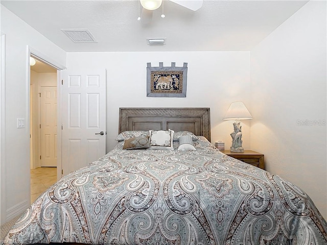 2103 SW 26th Ter, Cape Coral, FL 33914 - bedroom featuring light tile patterned floors and a ceiling fan